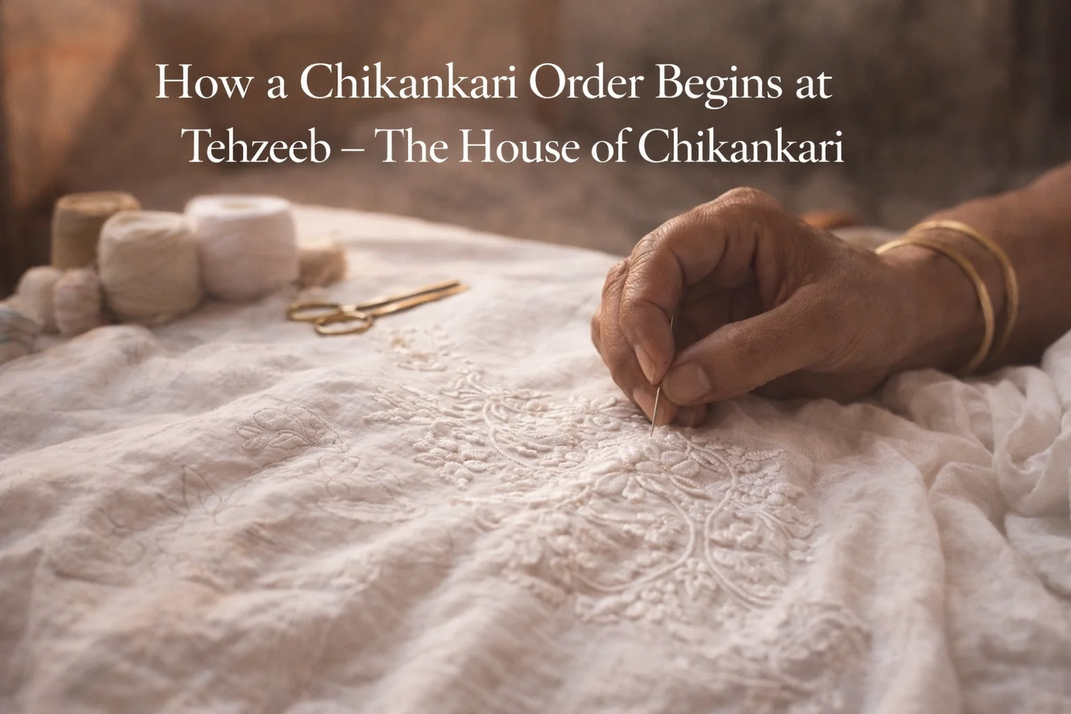 Chikankari artisan hand-embroidering white fabric with needle and thread in natural light
